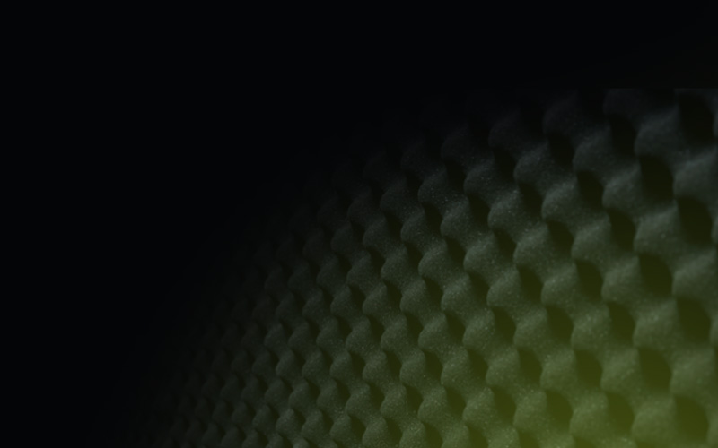 A black and green background with some white squares