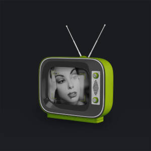 A green television with a picture of a woman on the screen.